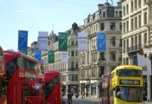 The Ultimate Guide to Planning a Product Launch Event Two Yellow and Red Parked Bus Near the Stop Light