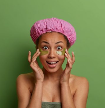 5 At-Home Tips for Reducing Fine Lines Around Your Eyes A person wearing a purple hat Description automatically generated