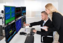 Is that company safe to invest in? What to look for A picture containing text, person, indoor, working Description automatically generated