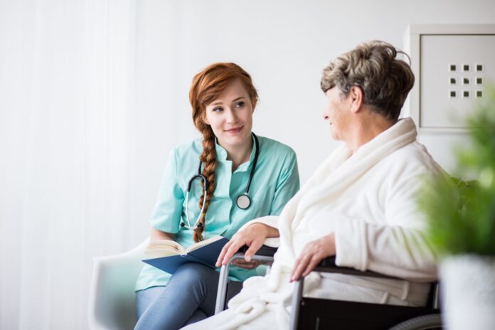 a-doctor-talking-to-a-patient-description-automat A doctor talking to a patient Description automatically generated with medium confidence