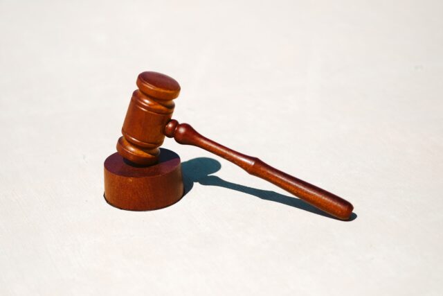 Photo by Tingey Injury Law Firm brown wooden tool on white surface