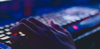iGaming in the U.S. Continues To Evolve Photo of Person Typing on Computer Keyboard