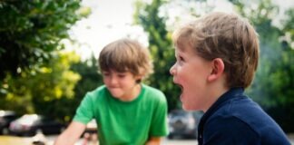 How the Child Tax Benefit Became the Canada Child Benefit boy in blue shirt screaming near boy in green crew-neck shirt