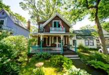Things to look for when buying a house white and brown wooden house surrounded by green trees during daytime