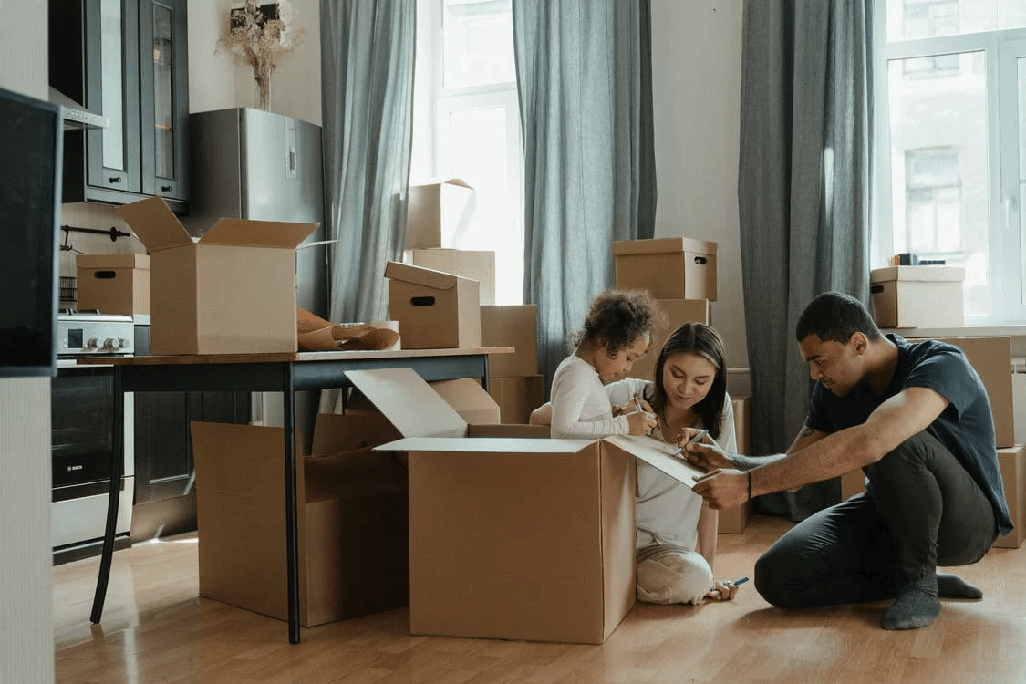 A family unpacking after moving to LaGrange Georgia