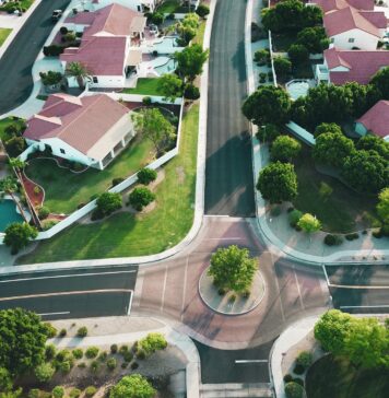 The Pros and Cons of Investing in Commercial Real Estate white-and-red houses