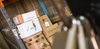 Compelling Reasons Why You Need Supply Chain Visibility Software brown cardboard boxes