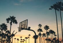 The Best U.S. Cities for Sports Fans to Visit silhouette photo of basketball system