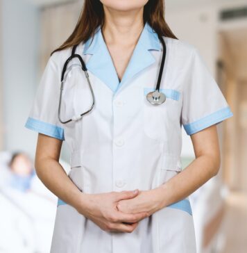 Types of Medicare Insurance plans woman in white button up shirt and blue stethoscope