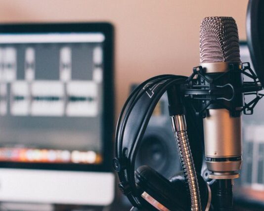 Increasing Business Trend on Podcasting for Internal Communications black and silver headphones on black and silver microphone