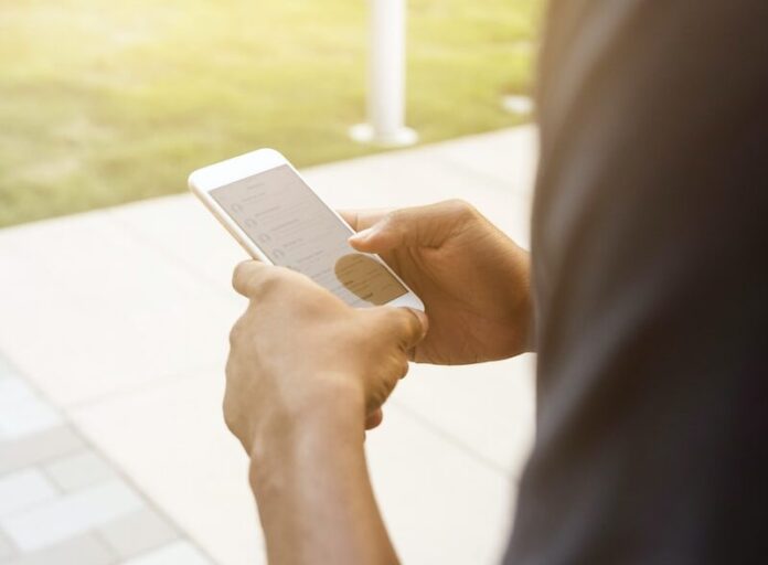 person holding post-2014 iPhone