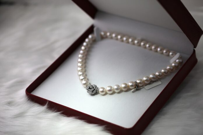 Photo by Cornelia Ng white pearl necklace with box