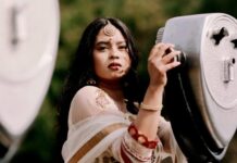 Jewellery That Goes Well With Lehenga woman in white dress holding her hair