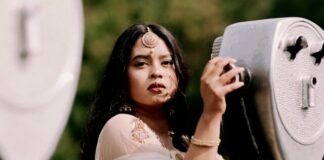 Jewellery That Goes Well With Lehenga woman in white dress holding her hair