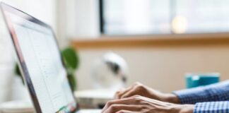 Why Should Businesses Migrate From Salesforce Classic to Lighting? person typing on silver MacBook