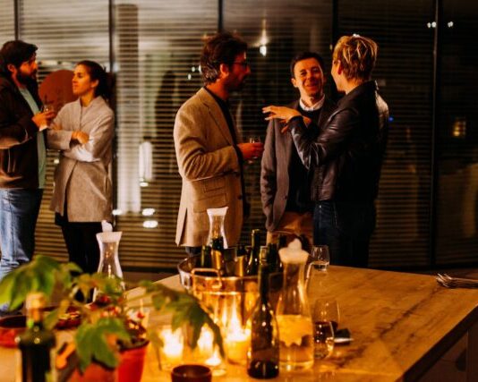 Plan a Dinner Party Easily With These 7 Online Services five person standing while talking each other
