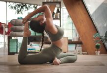 Everything You Need To Crush Your Fitness Goals woman doing yoga