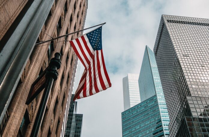Photo by Nik Shuliahin ðð low angle photo of flag of U.S.A