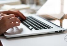 5 Times a Data Room Is a MUST for Your Business person using macbook pro on white table