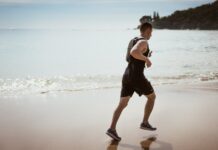 Preventive Healthcare After 50: 6 Unhealthy Habits You Should Drop Free Man Wearing Black Tank Top and Running on Seashore Stock Photo