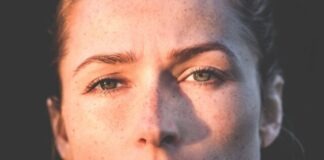 A Comprehensive Guide: How to Remove Wrinkles from Photos Easily sun rays of woman's face