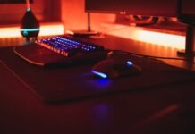 Unraveling the Mysteries of Aberrus, the Shadowed Crucible: A WoW Fan’s Perspective black computer keyboard beside black flat screen computer monitor