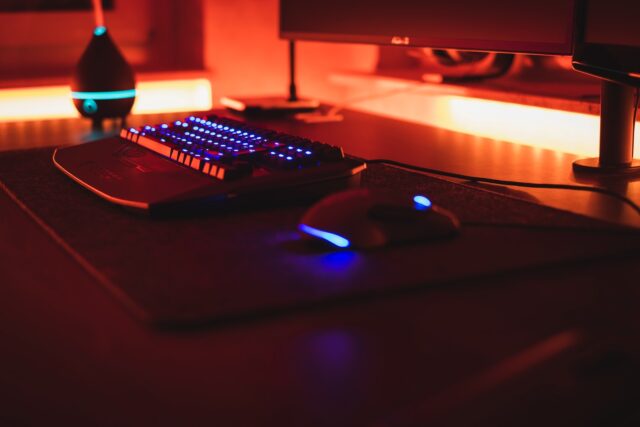 Photo by Stefan Gall black computer keyboard beside black flat screen computer monitor