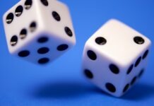 Understanding Gambling Addiction: When Fun Turns into a Risky Bet 2 white dices on blue surface