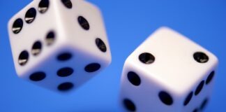 Understanding Gambling Addiction: When Fun Turns into a Risky Bet 2 white dices on blue surface