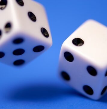Understanding Gambling Addiction: When Fun Turns into a Risky Bet 2 white dices on blue surface