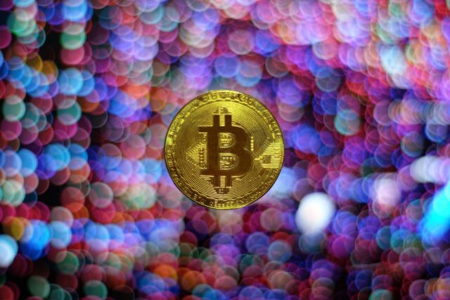 Photo by Viktor Forgacs round gold-colored Bitcoin illustration