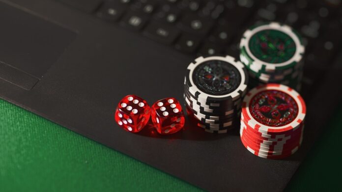 Photo by AidanHowe dice, chips, online gambling