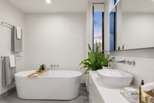 Photo by Steven Ungermann white ceramic bathtub near green potted plant