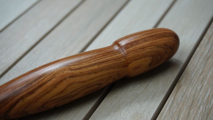 Photo by Gwen Mamanoleas brown wooden handle on white wooden table