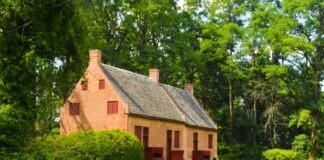 How To Avoid Legal Fees When Selling Your Home brown brick house surrounded by green trees during daytime