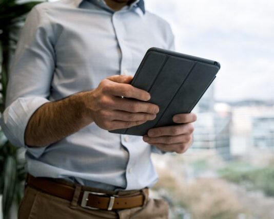 Unlocking Hidden Features in the Latest Version of Aviator person holding black smart cover during daytime