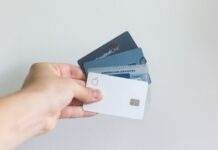 What are lifetime-free credit cards, and how are they beneficial to us? white and blue magnetic card