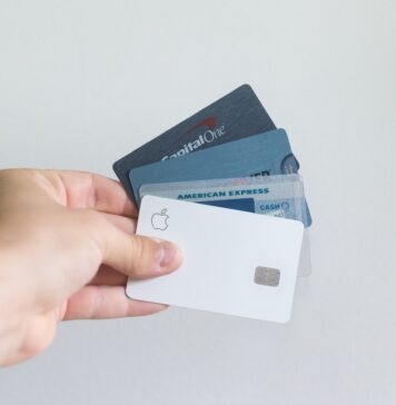What are lifetime-free credit cards, and how are they beneficial to us? white and blue magnetic card