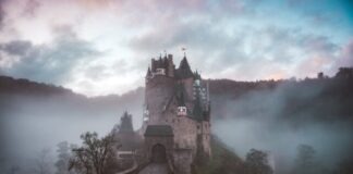 9 Most Enchanting Fairytale Slots You Can Play Online closeup photo of castle with mist