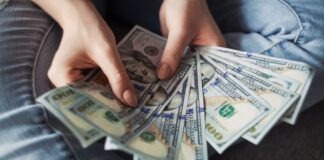 Mastering Bike Loan Interest Rates: Your Path to Financial Freedom fan of 100 U.S. dollar banknotes