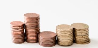 Top 9 Myth-Themed Slots for Legendary Wins stacked round gold-colored coins on white surface