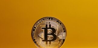 Getting Started: Acquiring Crypto for Online Gambling Bitcoin on Yellow Studio Background