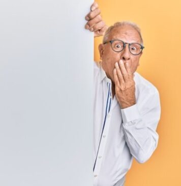 The Steps to a Successful Business Sale man in white dress shirt wearing black framed eyeglasses