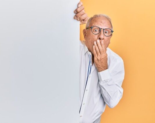 The Steps to a Successful Business Sale man in white dress shirt wearing black framed eyeglasses