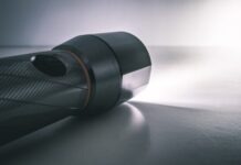 How Does the Small Tactical Flashlight Enhance Personal Security? Black Flashlight Turned On