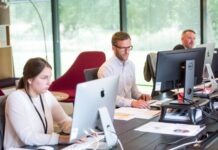 Aircall Business Phone Service: The Ideal Communication Solution for SMBs man sitting in front of table