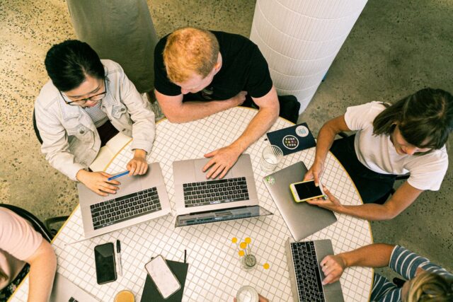 Photo by Canva Studio Photo Of People Using Laptops