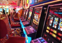 The Evolution of Online Slots: From Classic to Cutting Edge Technologies arcade machine with red and white chairs
