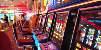 The Evolution of Online Slots: From Classic to Cutting Edge Technologies arcade machine with red and white chairs