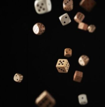 The Significance of Cross-border Gambling Laws a group of dices flying in the air